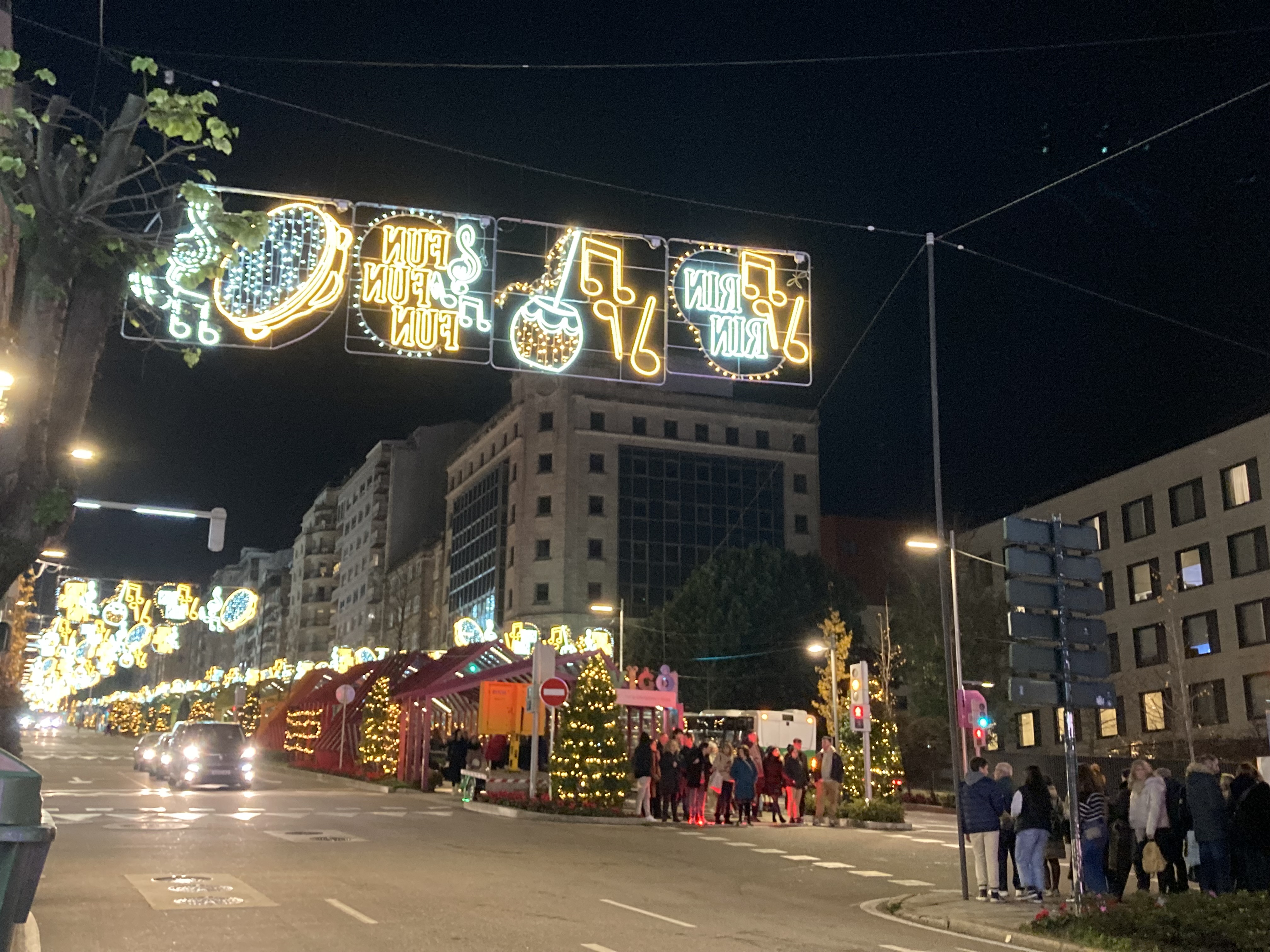 a street with christmas lights
